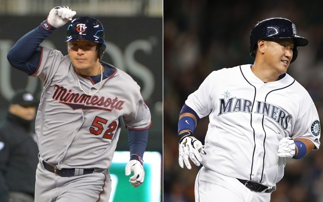 Byung Ho Park (l.) and Dae Ho Lee hit their first MLB home runs Friday night.