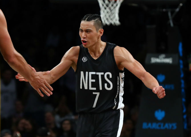 Jeremy Lin celebrates against the Indiana Pacers during their game at the Barclays Center in New York City. [Image by Al Bello/Getty Images]
