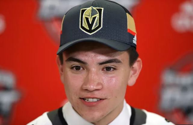 June 23, 2017; Chicago, IL, USA; Nick Suzuki poses for photos after being  selected as the number thirteen overall pick to the Vegas Golden Knights in  the first round of the 2017