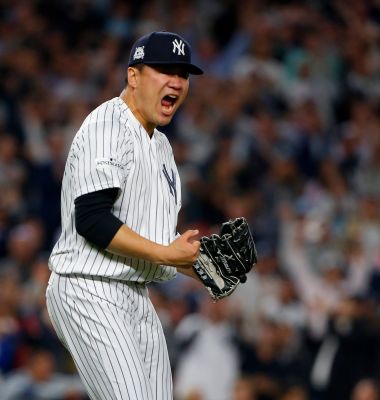 Masahiro Tanaka of the Yankees reacts after the